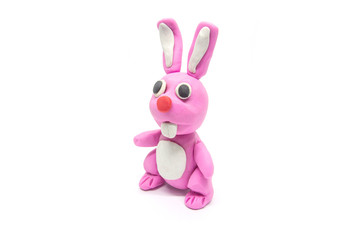 Play dough rabbit on white background. Handmade clay plasticine