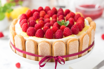 Raspberry tiramisu with lemon curd decorated red bow