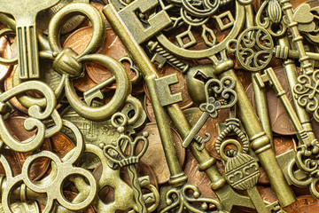 Old vintage keys gold texture on copper coin  abstract background.