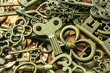 Old vintage keys gold texture on copper coin  abstract background.