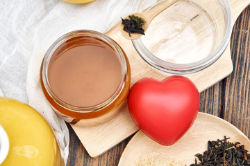 Kombucha tea and red heart, Scoby and fermented apple fruit drink, Probiotics food source to improve good digestion system, Healthy superfood.