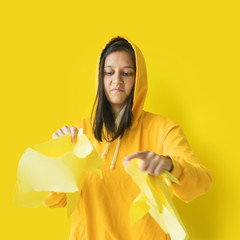 Young girl hood jacket safely shows real emotions