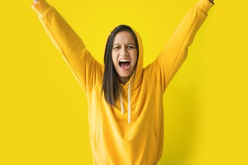 Young girl hood jacket safely shows real emotions