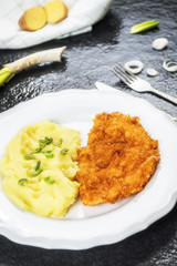 Chicken steak or schnitzel with mashed potatoes