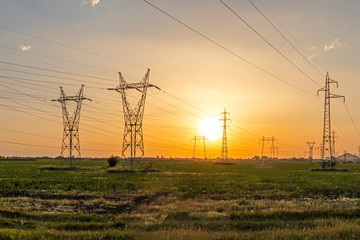 Sunset Landscape of High-voltage power lines in the land around city of Plovdiv, Bulgaria