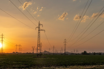 Sunset Landscape of High-voltage power lines in the land around city of Plovdiv, Bulgaria