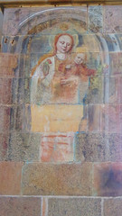 Faded fresco on cathedral wall