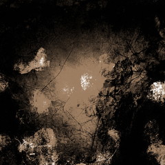 Grunge background and texture with various elements of noise and with spots in dark black color. Dirt texture © Abstract51