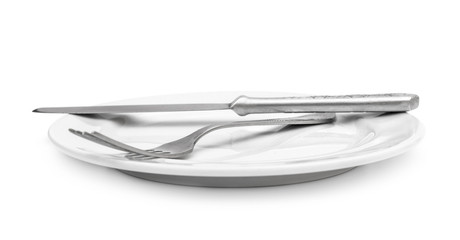 Plate with fork and knife on white background.
