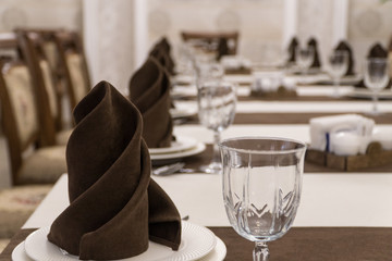 serving banquet table in a luxurious restaurant in brown and white style