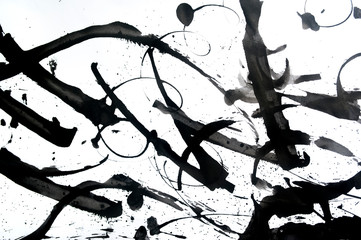 Abstract brush strokes and splashes of paint on paper. Grunge art hand draen calligraphy background