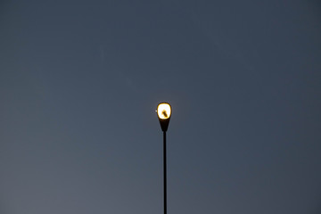 street lamp on the background of blue sky