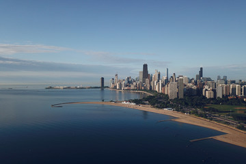 panorama of Chicago from the height and lake Michigan, skyscrapers morning sun