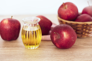Close up red Apple fruit  and  apple cider vinegar juice , Helps Lose Weight and Reduces Belly Fat , healthy food
