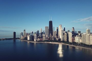 Fototapeta na wymiar panorama of Chicago from the height and lake Michigan, skyscrapers morning sun