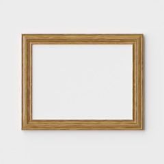 Wooden picture or photo frame on white wall with shadows