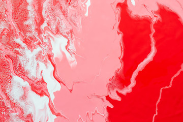 Acrylic Fluid Art. Pink and red waves and whites inclusion. Abstract marble background or texture