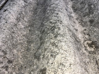 fragment of undulating slate covering of the building