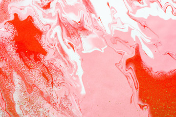 Acrylic Fluid Art. White pink red waves and gold inclusion. Abstract marble background or texture