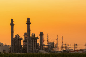 Fototapeta na wymiar Gas turbine electrical power plant in industrial Estate at sunset.