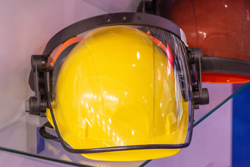 Working helmets to protect builders with headphones and a headlamp