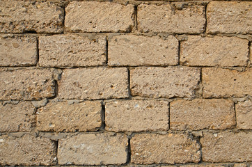 The masonry walls bonded with cement. Background.