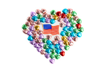 A USA badge and heart shape candies