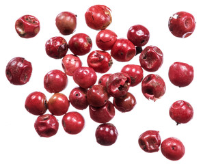 Red peppercorns isolated on white background.