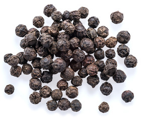Black peppercorns isolated on white background.