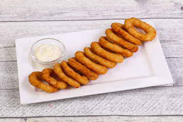 Squid rings snack with sauce