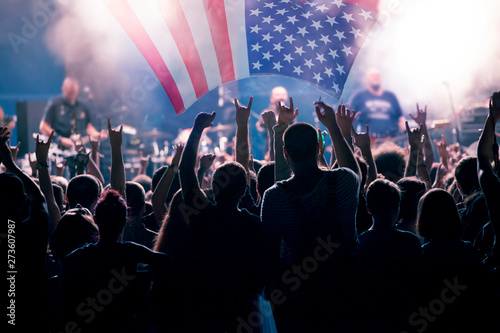 United States flag - crowd celebrating 4th of July Independence Day.