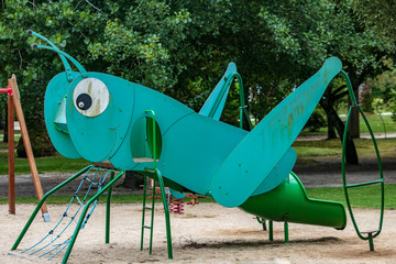 old toy grasshopper