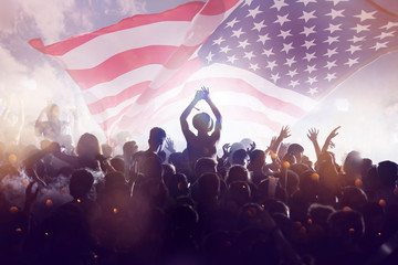 United States flag - crowd celebrating 4th of July Independence Day.