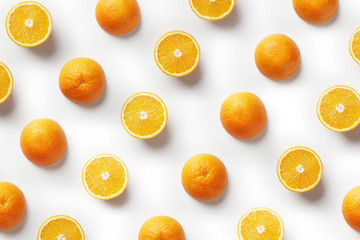 Tropical abstract background. Orange fruit on the white background