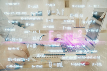 Science formula hologram with man working on computer on background. Education concept. Double...