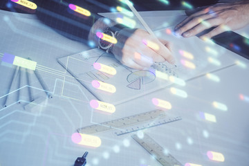 Human hands with tech theme multi exposure drawings.
