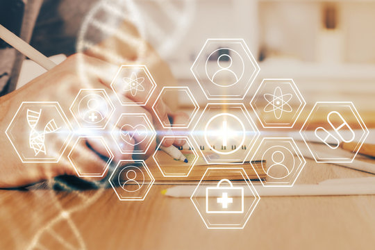 Man's hands working with notes background. Genetic engineering and gene manipulation concept.