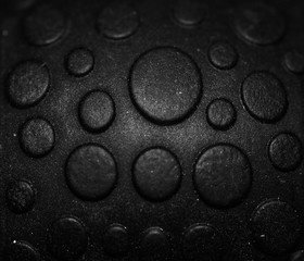 Black and white close up shot of a piece of rubber