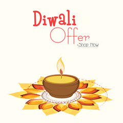 Diwali Offer with a massage, illuminated oil lit lamp on rangoli.