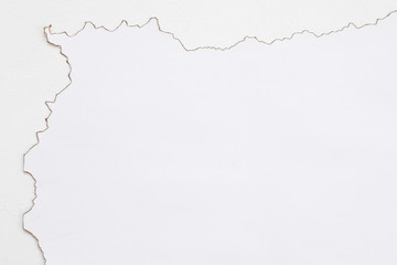 Cropped flat lay of burnt paper on white surface. Blank manuscript design. Abstract background. Copy space.