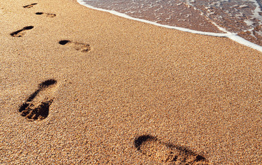 Human footprints on the seashore
