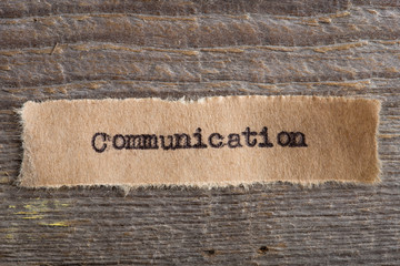 communication word on a piece of paper close up, business creative motivation concept