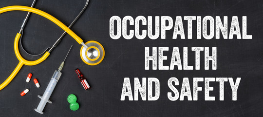 Stethoscope and pharmaceuticals on a blackboard - Occupational Health and Safety
