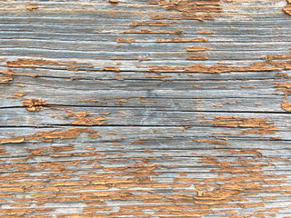 Grunge background. Peeling paint on an old wooden floor. Vintage wood background. Old Wood texture