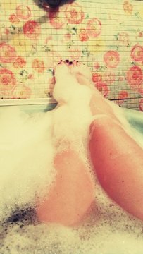 feet in the bed