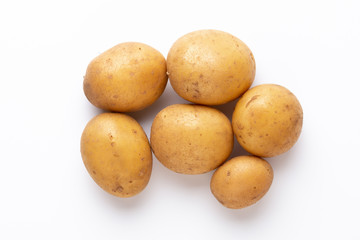Potatoes isolated on white background. Flat lay. Top view.