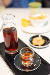 cup of coffee in glass on table
