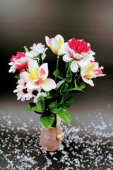 Clay vase painted with flowers