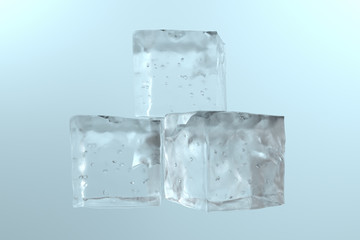 Obraz premium Pile of 3 blue ice cubes isolated on a white table