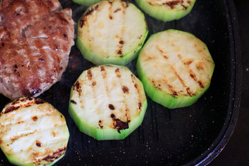Meat and zucchini on the grill pan. Healthy food. Healthy food at home